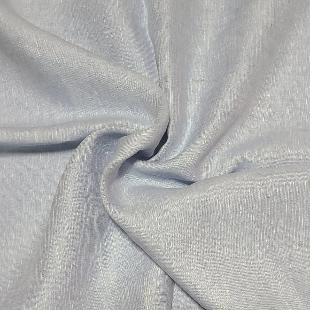 light blue sky linen shaped in a swirl pattern