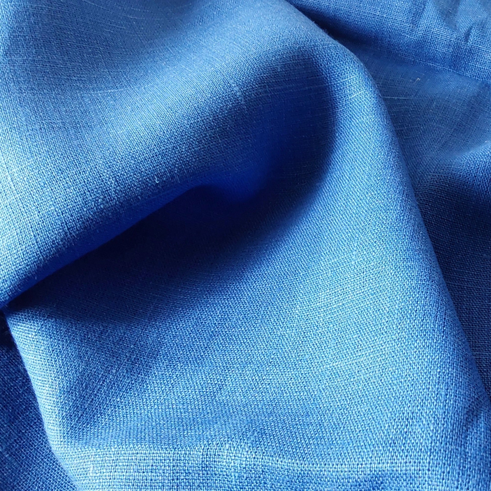 Close-up of blue fabric with a textured surface