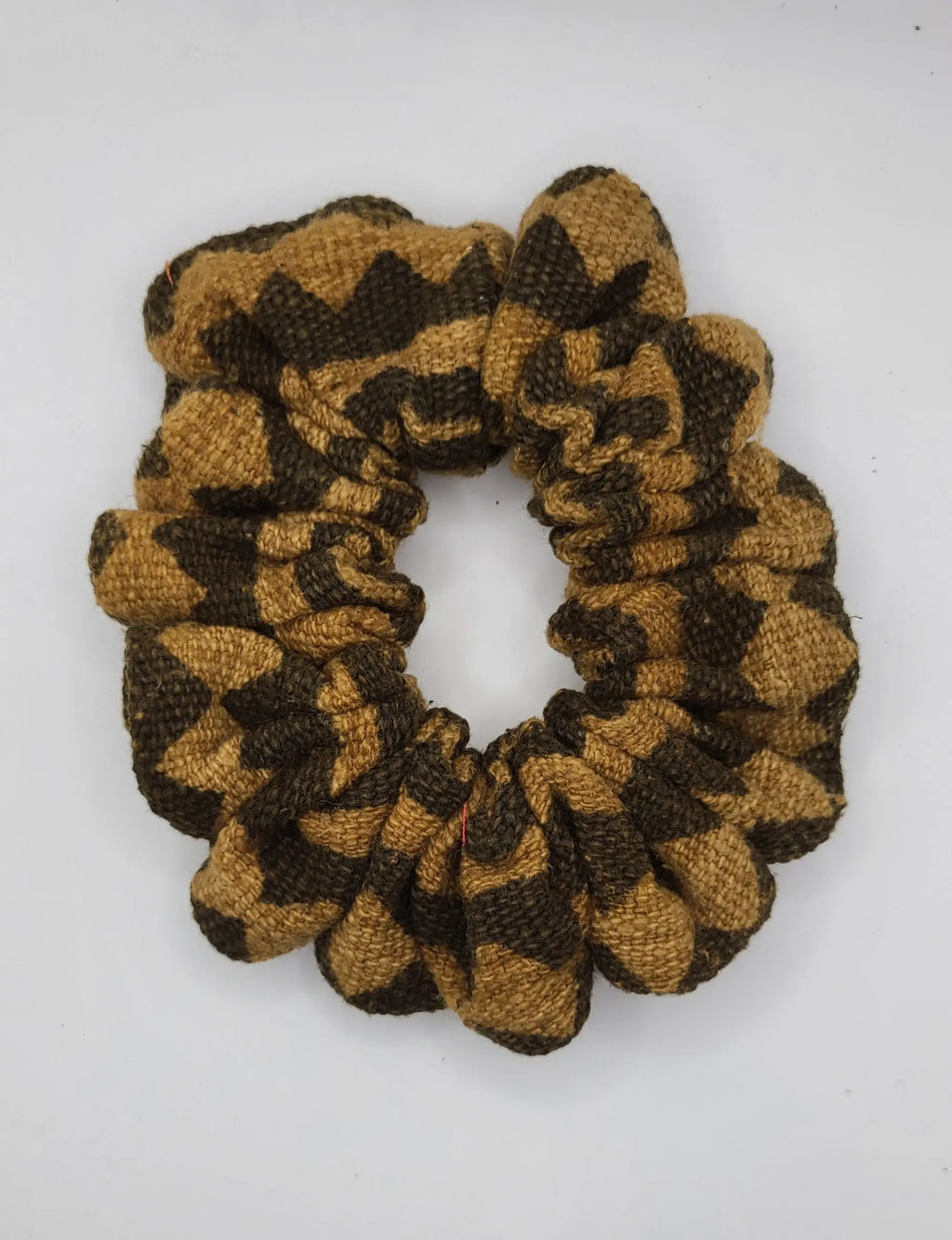 Brown and beige scrunchie on a white background